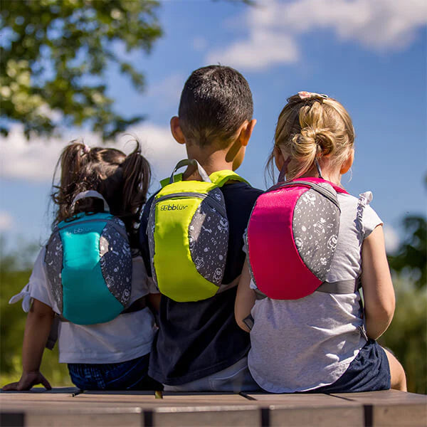 Kid shop carrying backpack